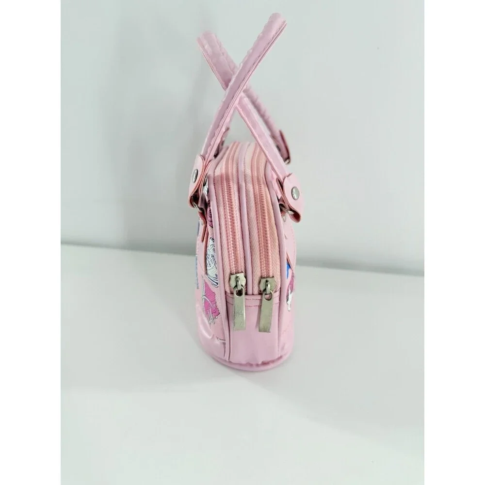 HCC Small/Mini Handbag pink with a print of sneakers, cameras, & cassette tapes